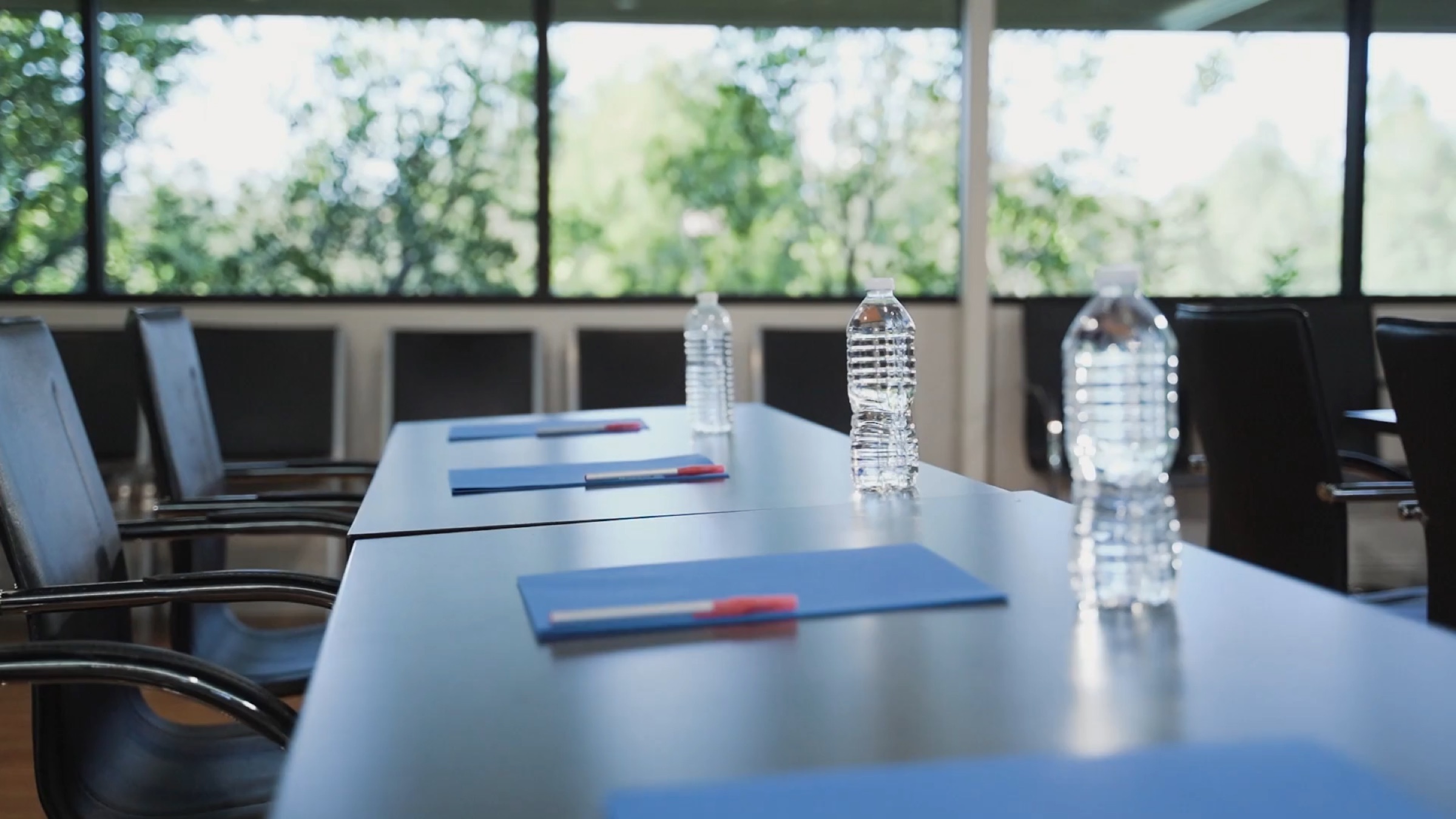 Bottles of spring water on a boardroom table